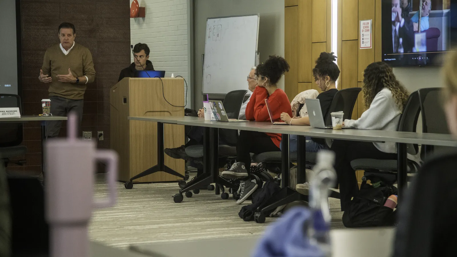 TEGNA Media speaking with students in a class. 