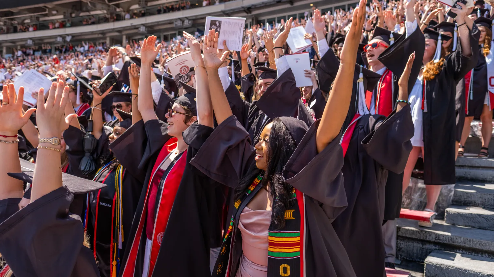 Students spell O H I O at Graduation!