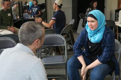 A student talks with an alumni at a Career Connections event