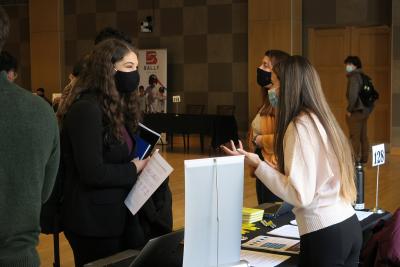 A student talks with an employer during the 2022 Spring Career Fair.