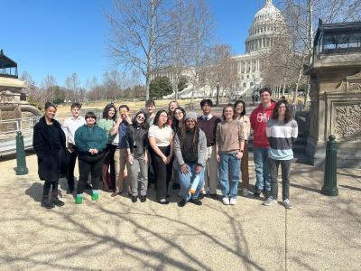 Student standing in front of the capital building in Washington DC