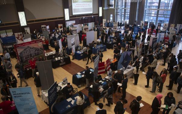 Students and employers interacting at the Spring Career Fair