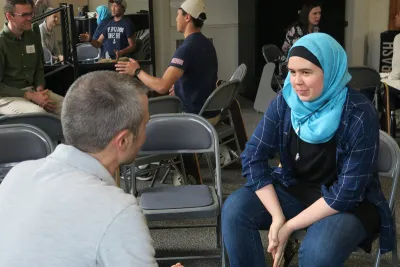 A student talks with an alumni at a Career Connections event
