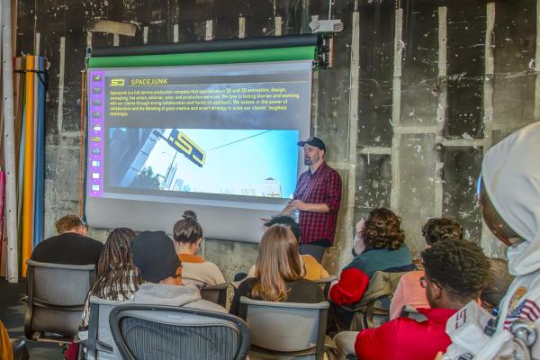 Students Listening at an Immersion Event