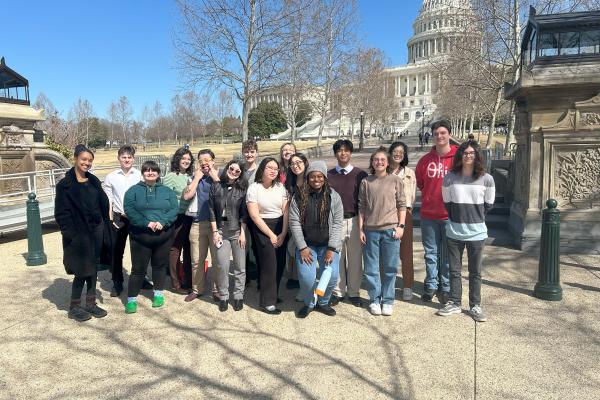 Student standing in front of the capital building in Washington DC