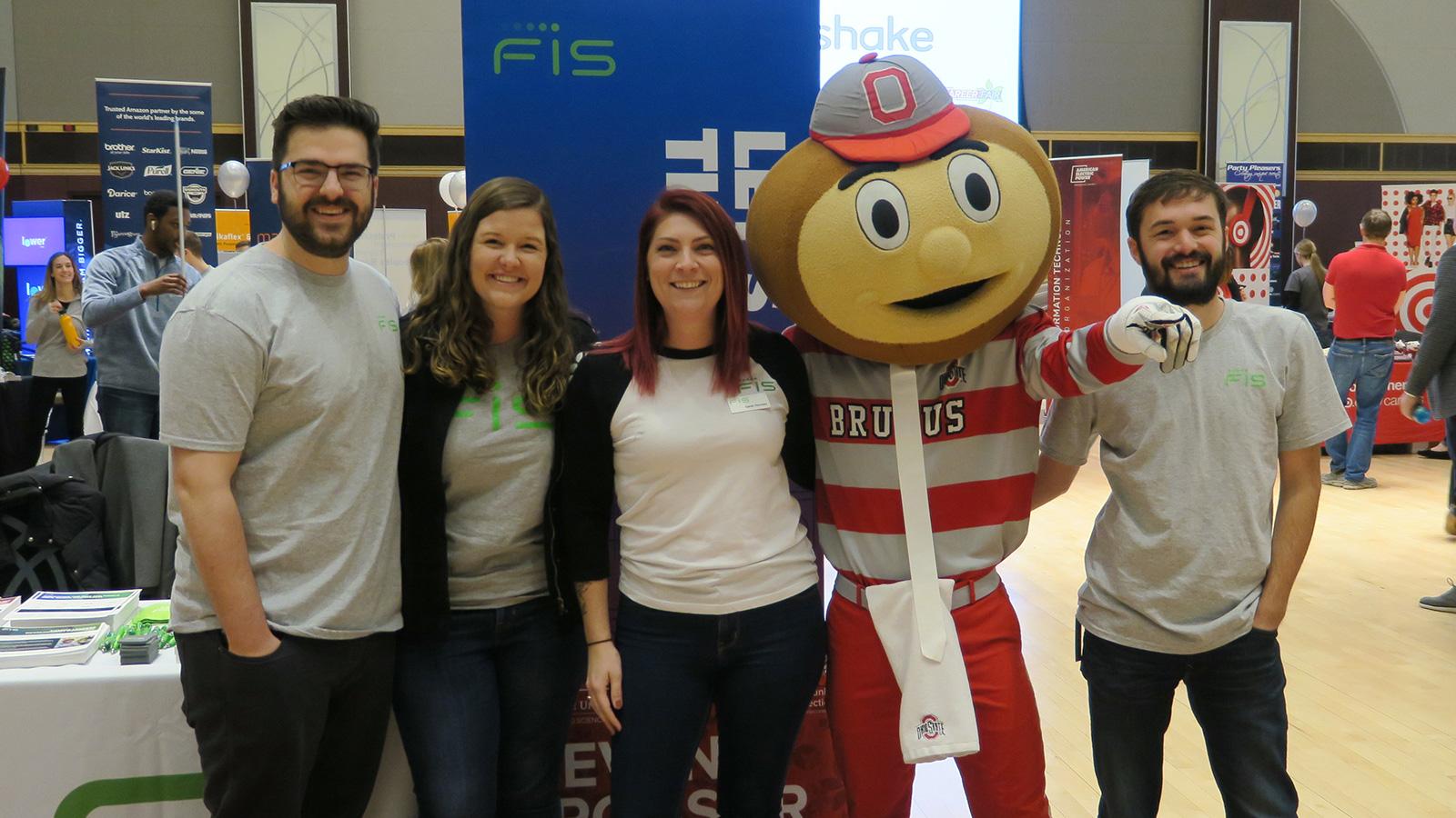 Employees from FIS pose with Brutus Buckeye at the Spring Career Fair